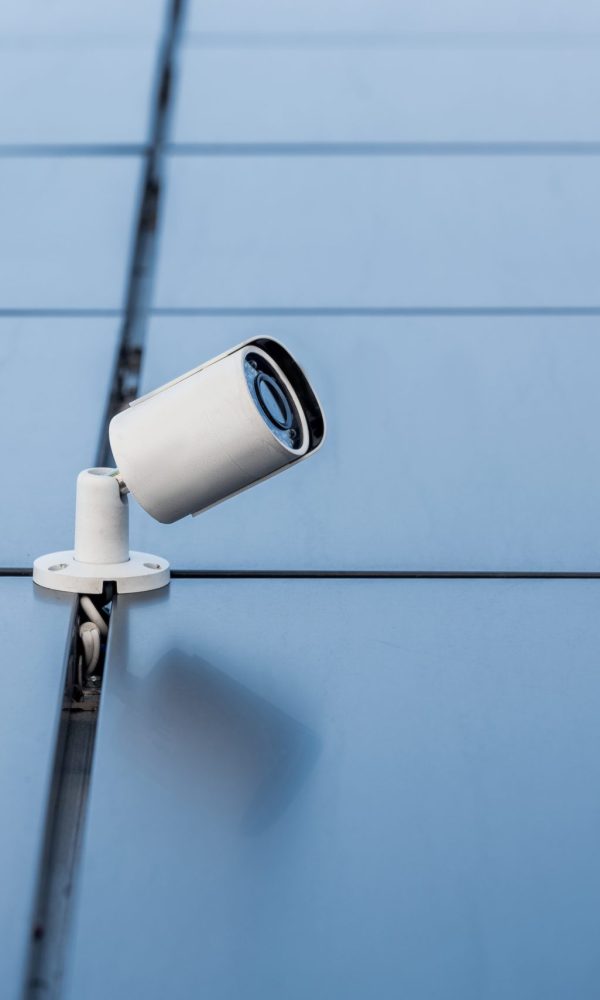 one security camera on office building, security system concept